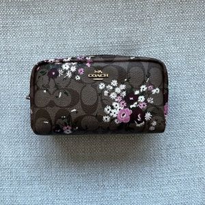 Coach floral cosmetic case.